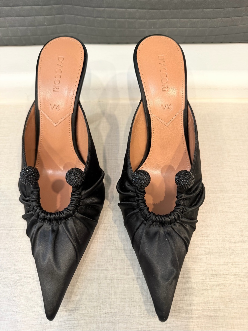 V4 Black Pointed Satin Mule with Decorative Pom Detail
